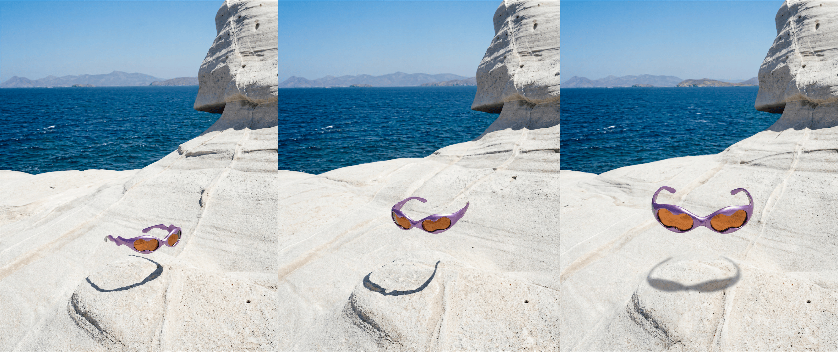 sunglasses floating above white rock by ocean