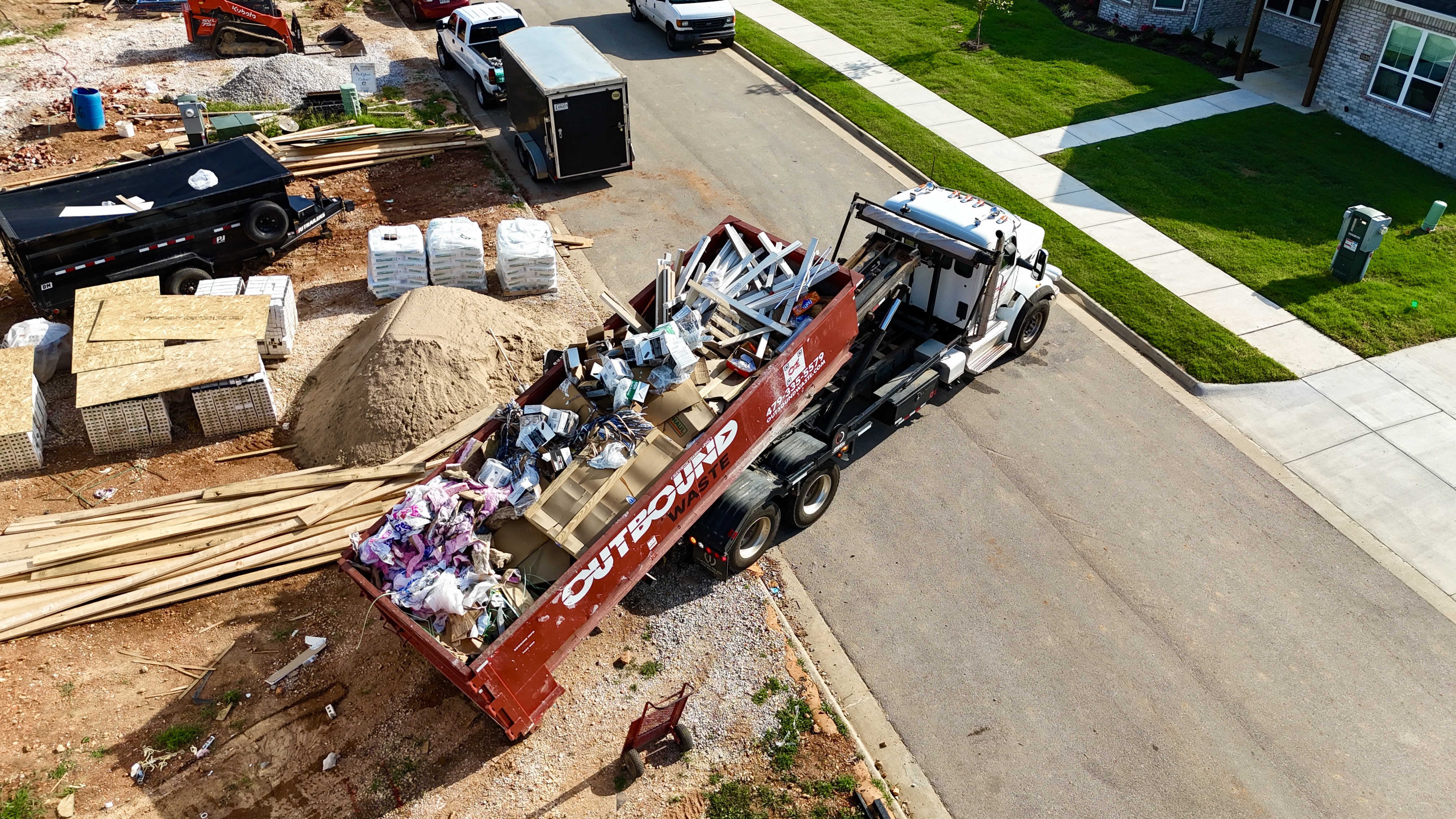 What can go in a roll-off dumpster