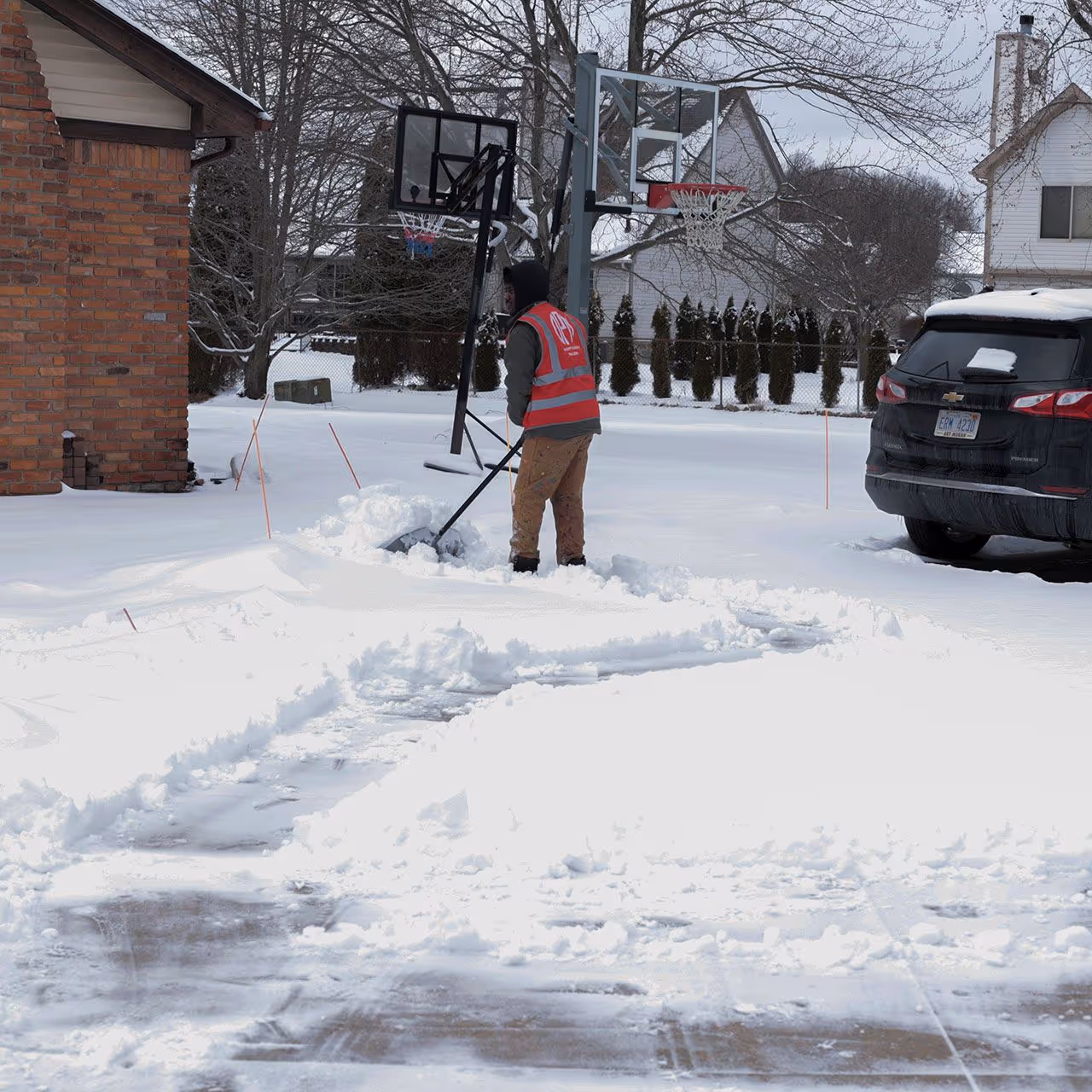 Owens Property Managers team maintaining driveway near me