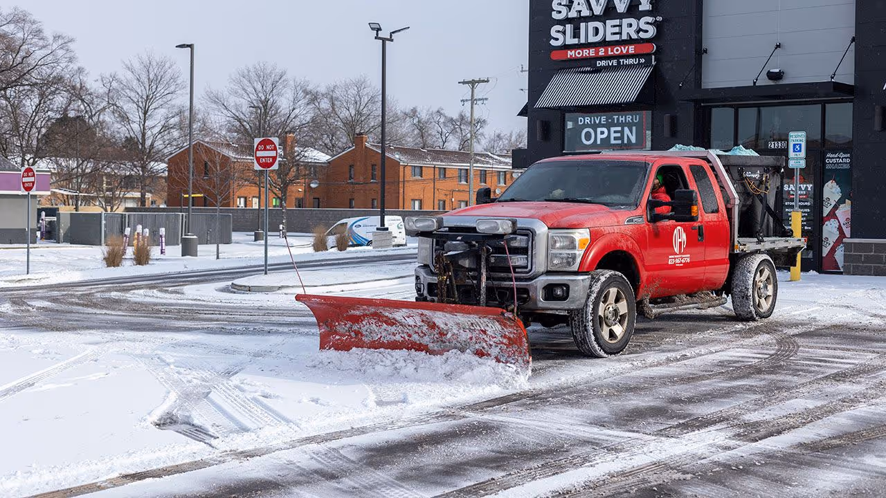 Commercial snow plowing service Berkley MI Owens Property Managers