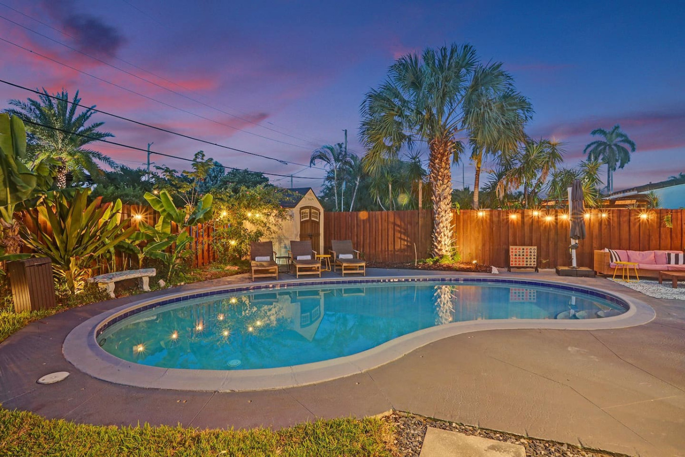 Villa Roosevelt saltwater pool lit at twilight