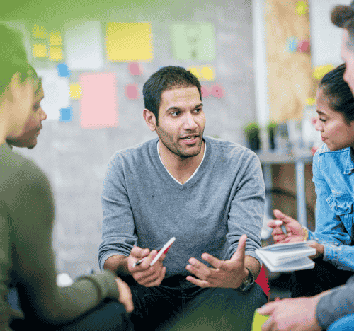 Man explaining in meeting