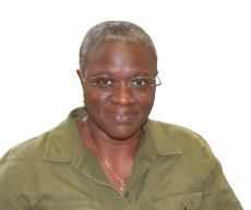 Ms. Rogers smiling in her school office