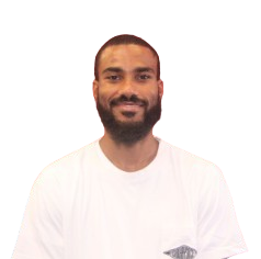 Mr. Heath smiling in a white shirt