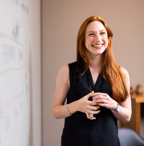 Woman standing and smiling
