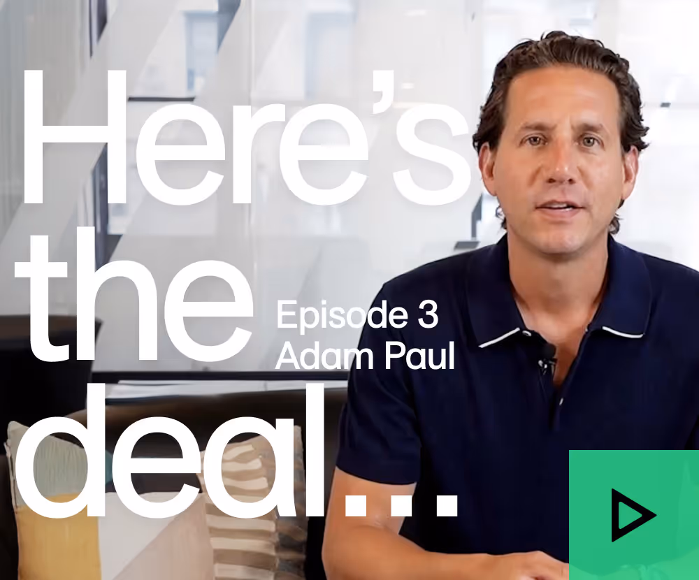 Man with brown hair wearing navy blue polo shirt sitting next to text on a promotional graphic.