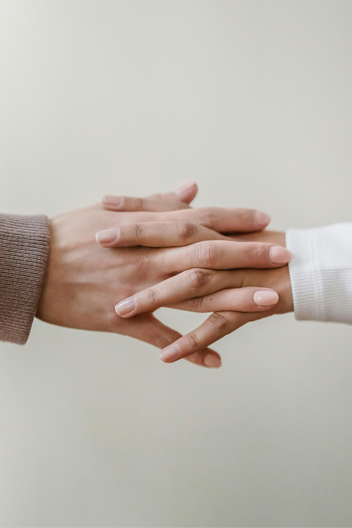 Two hands interlaced