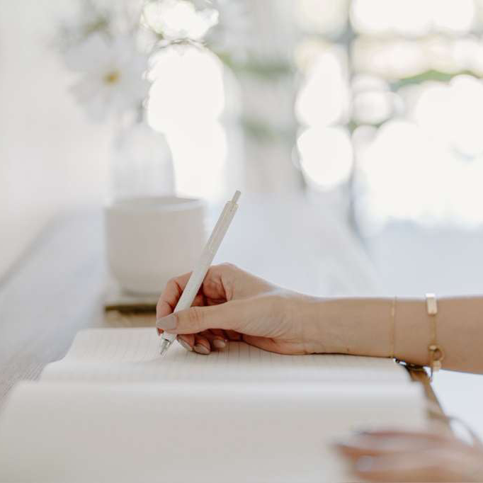 Hand writing in notebook