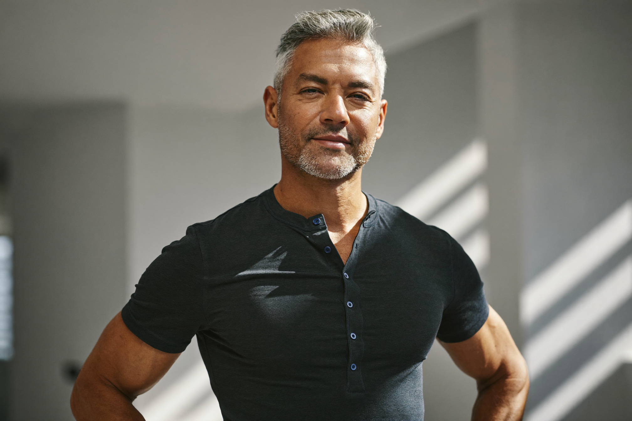 A confident, healthy man in his late 40s representing renewed energy from testosterone therapy for men in Wilmington, NC