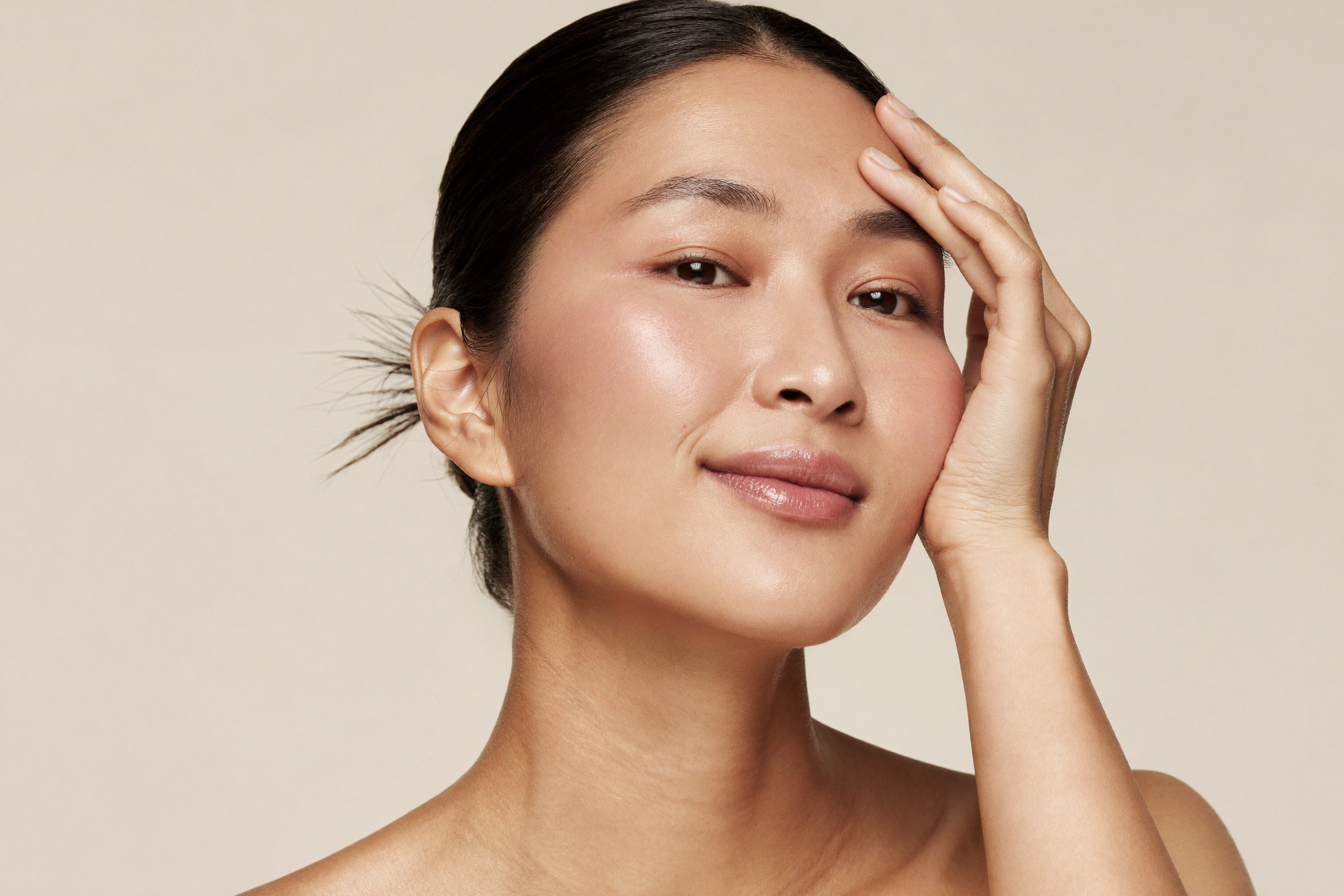 A woman with naturally glowing, healthy skin representing natural, regenerative aesthetic results in Wilmington, NC
