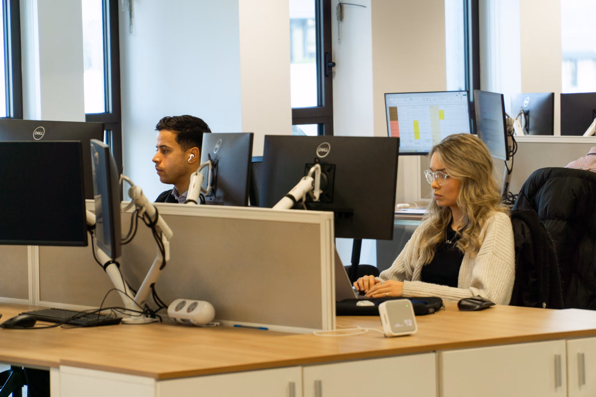 Team members working at desk