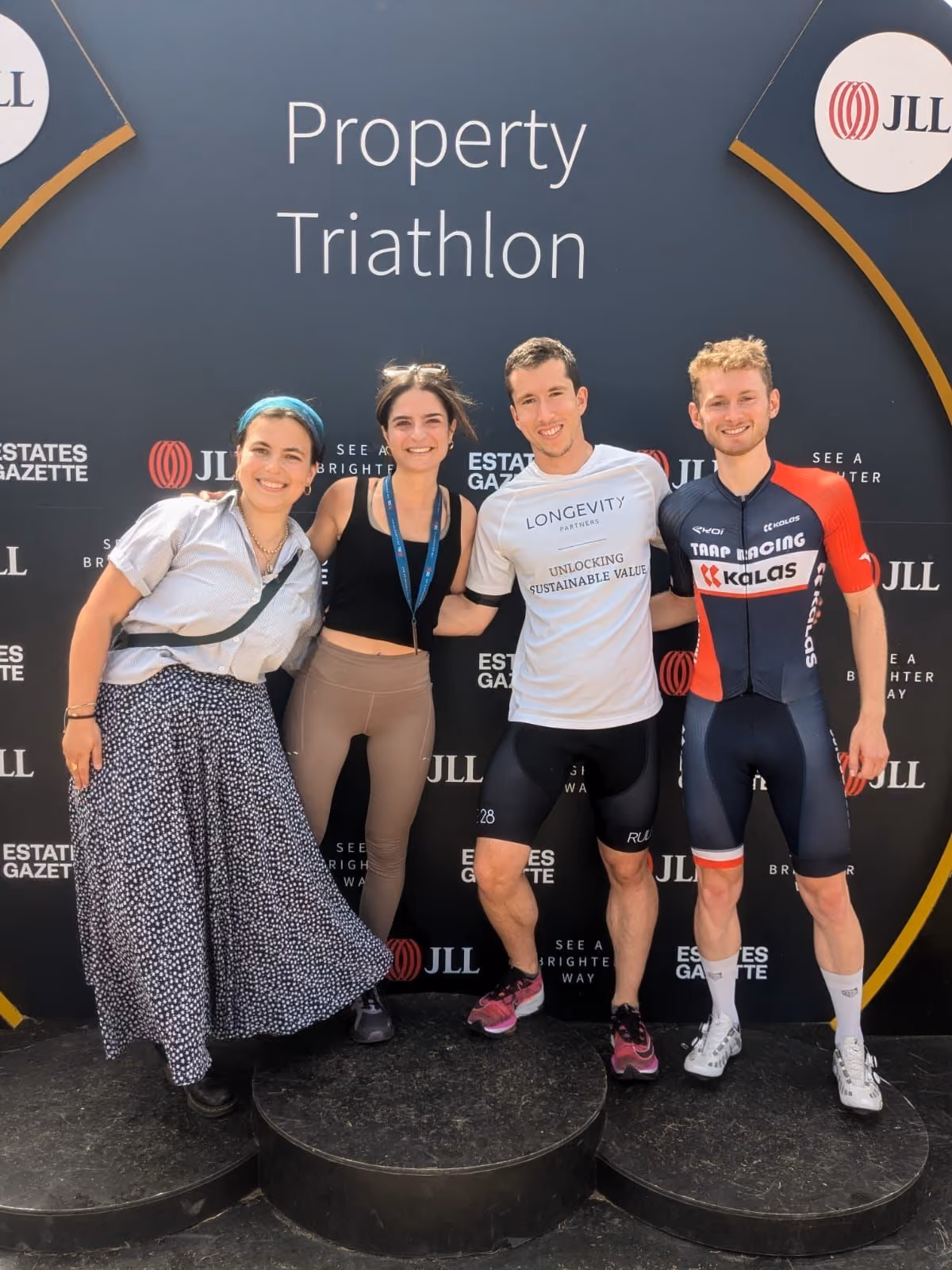 Longevity members at JLL triathlon