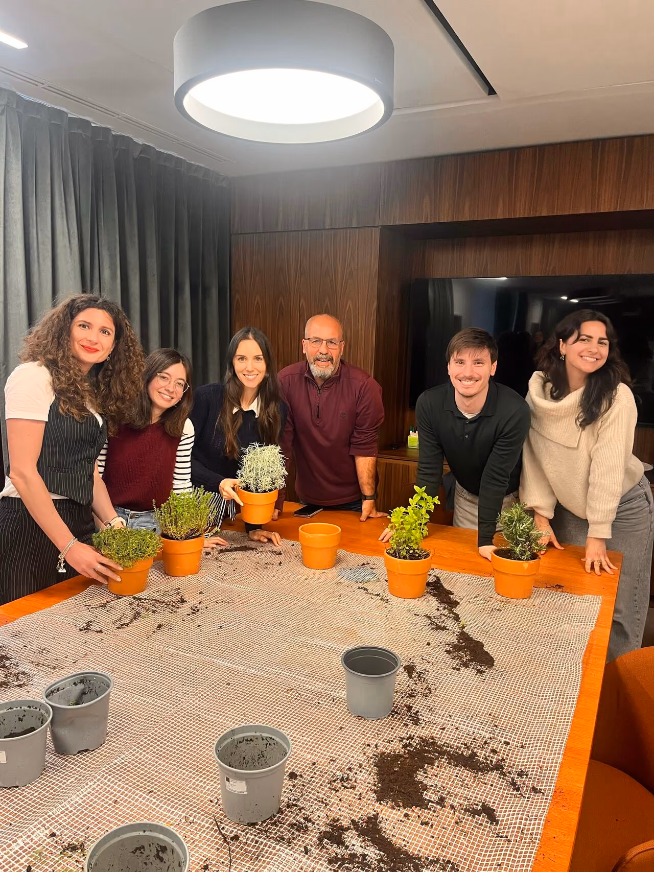 Italian team members organising planting session