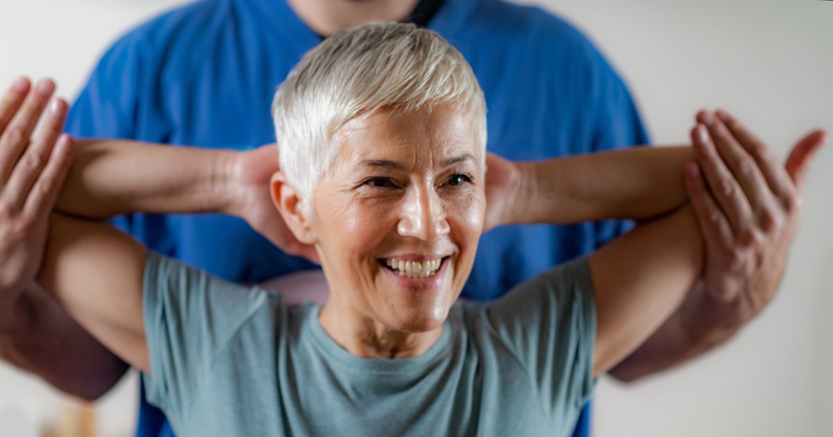 Smiling older woman with short hair enjoying a moment of joy