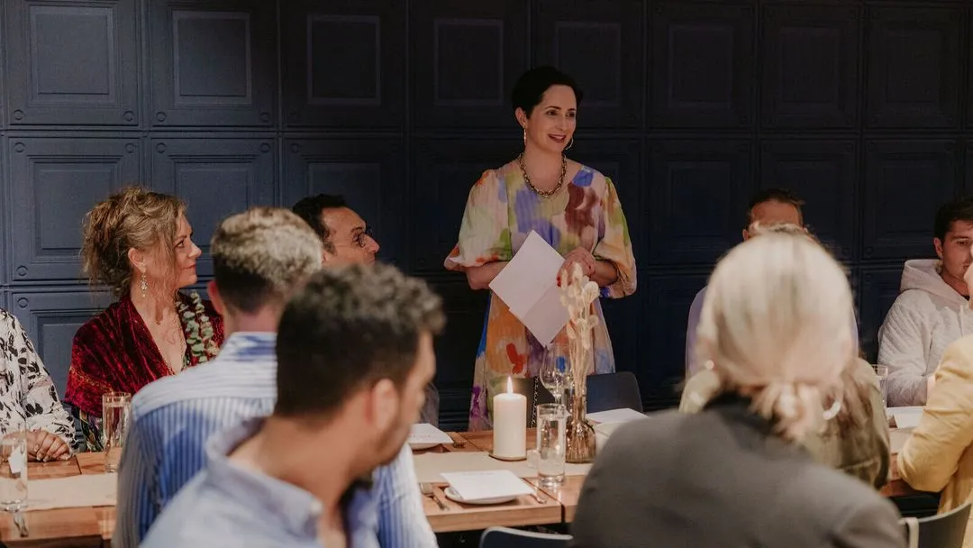 Woman talking to group