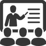 A teacher lecturing a class