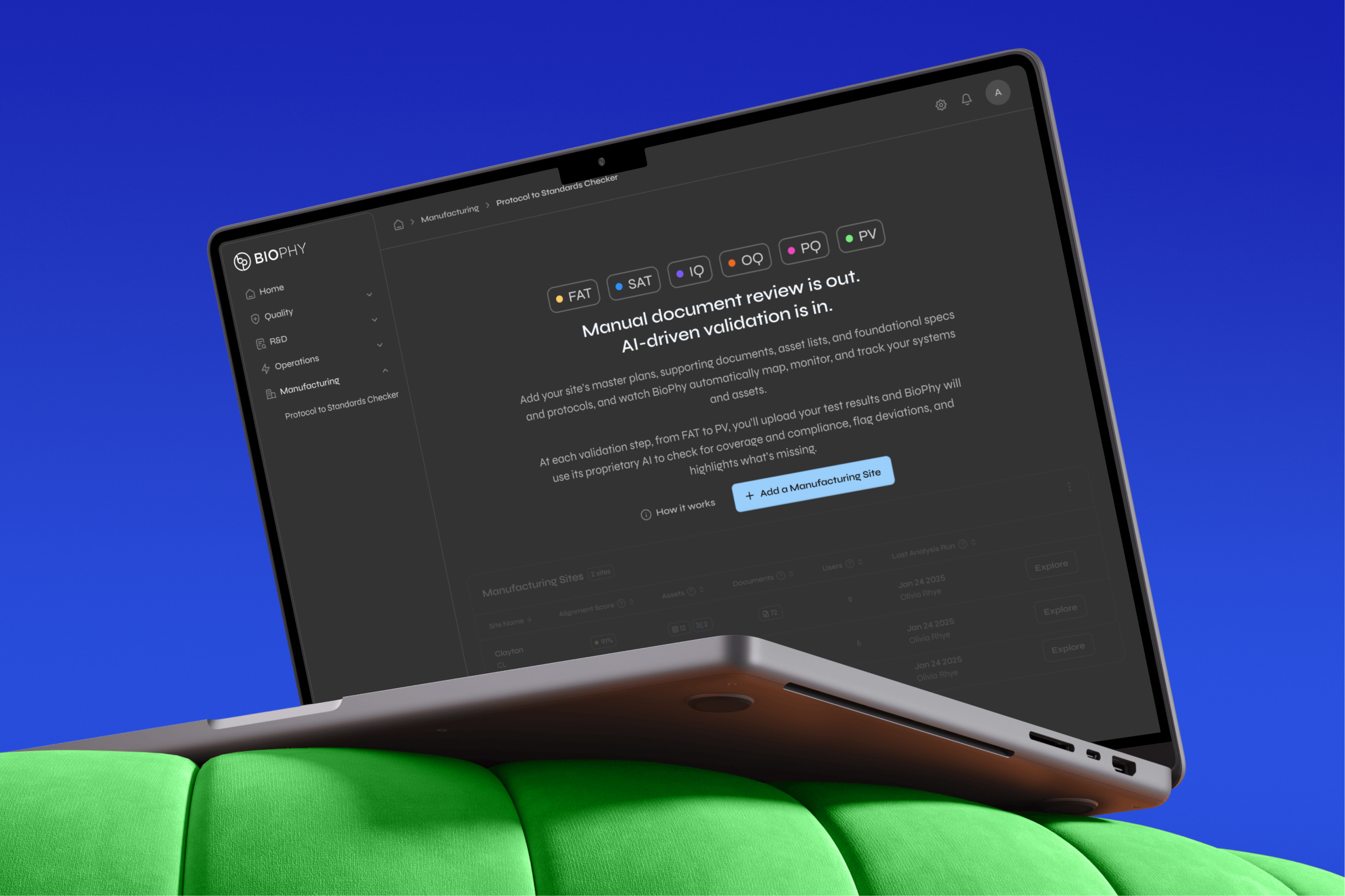 A woman and child sitting on a couch under a blanket, holding a tablet showing ‘Curious George Activities’ on the screen.