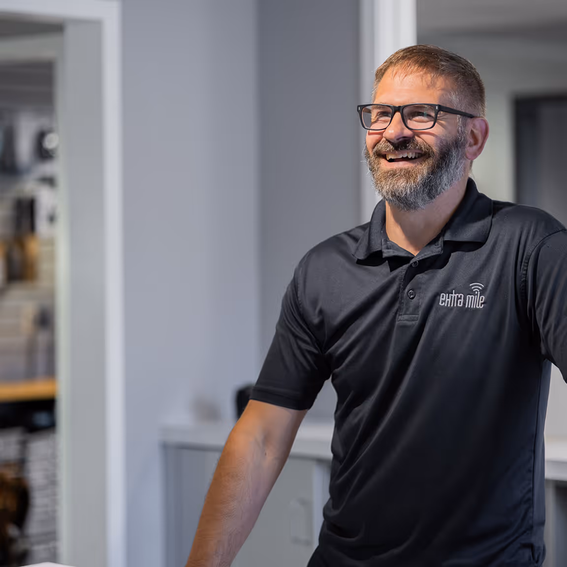 Owner Mike Davis greeting an IT customer in their office