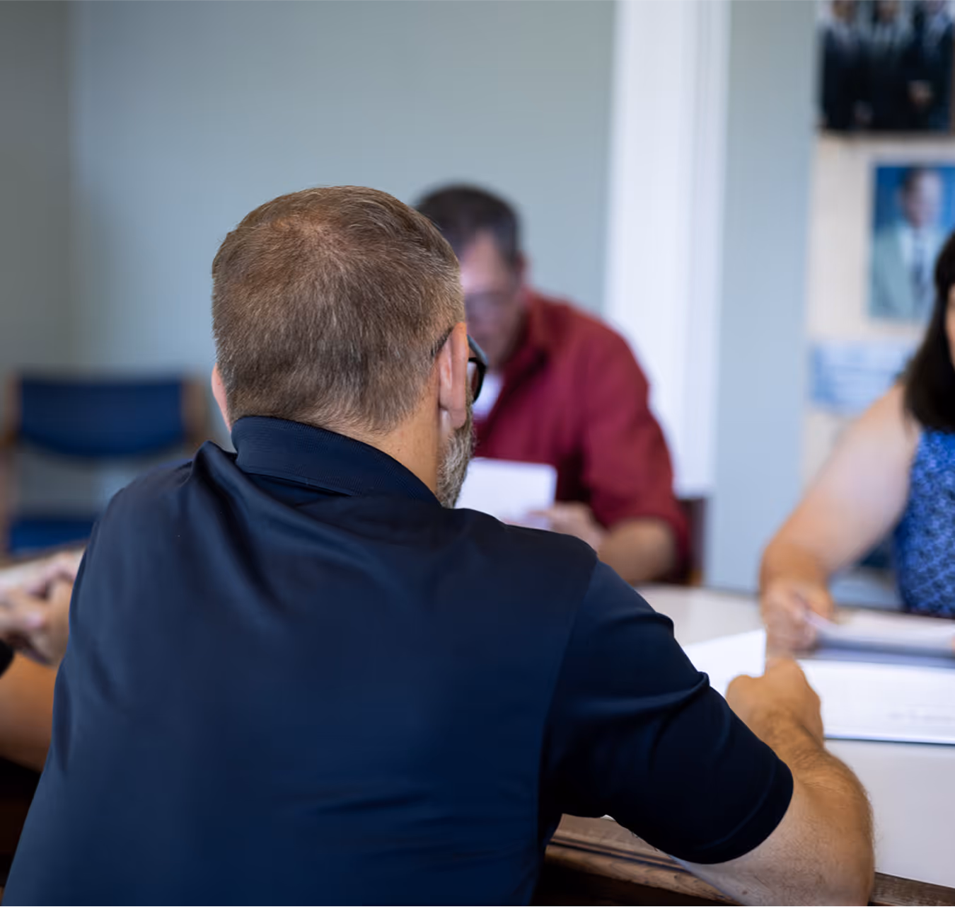 Extra Mile owner Mike Davis explaining details of the Managed Services plans to IT customers in a consultation