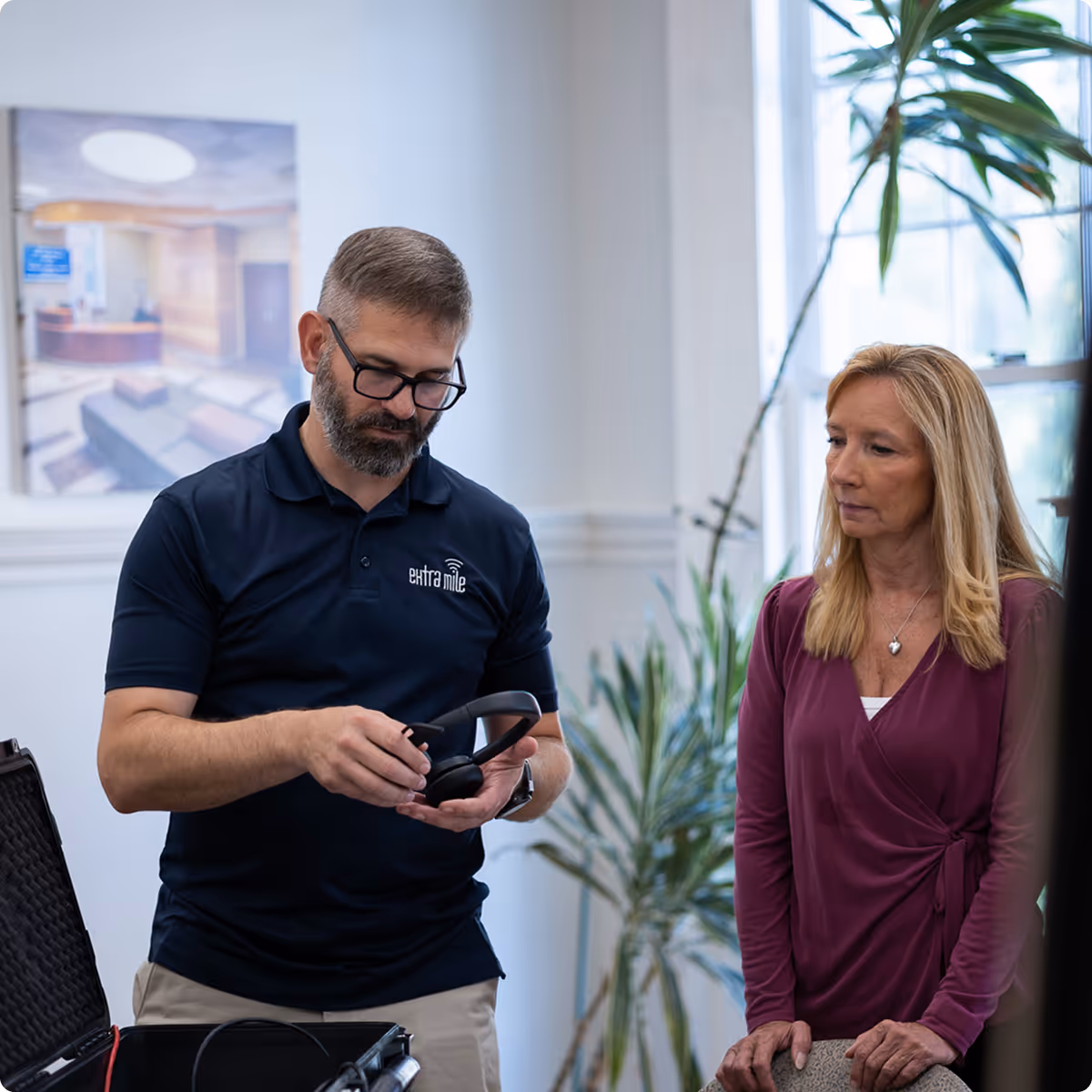 Owner Mike Davis providing a demo of their VoIP business phone services to a prospective client