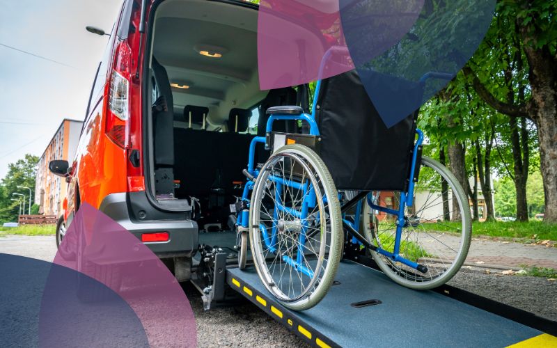 A wheelchair is being carefully loaded into a van, highlighting the commitment to providing accessible transport solutions that align with NDIS (National Disability Insurance Scheme) standards, ensuring equal mobility and independence for all participants.