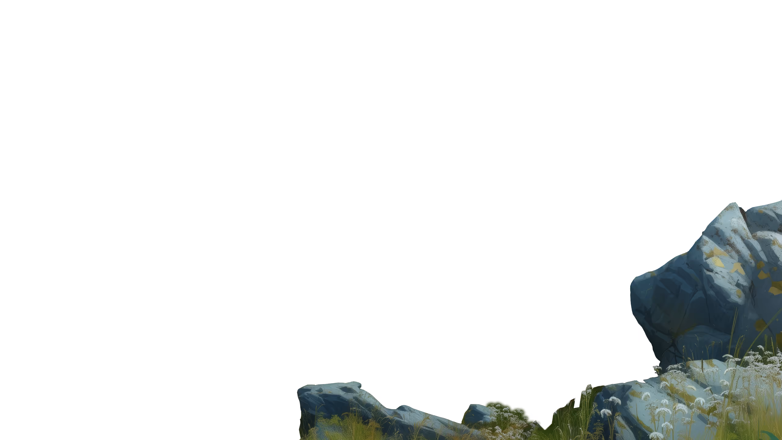 Group of large gray rocks and green grass with small white flowers at their base.