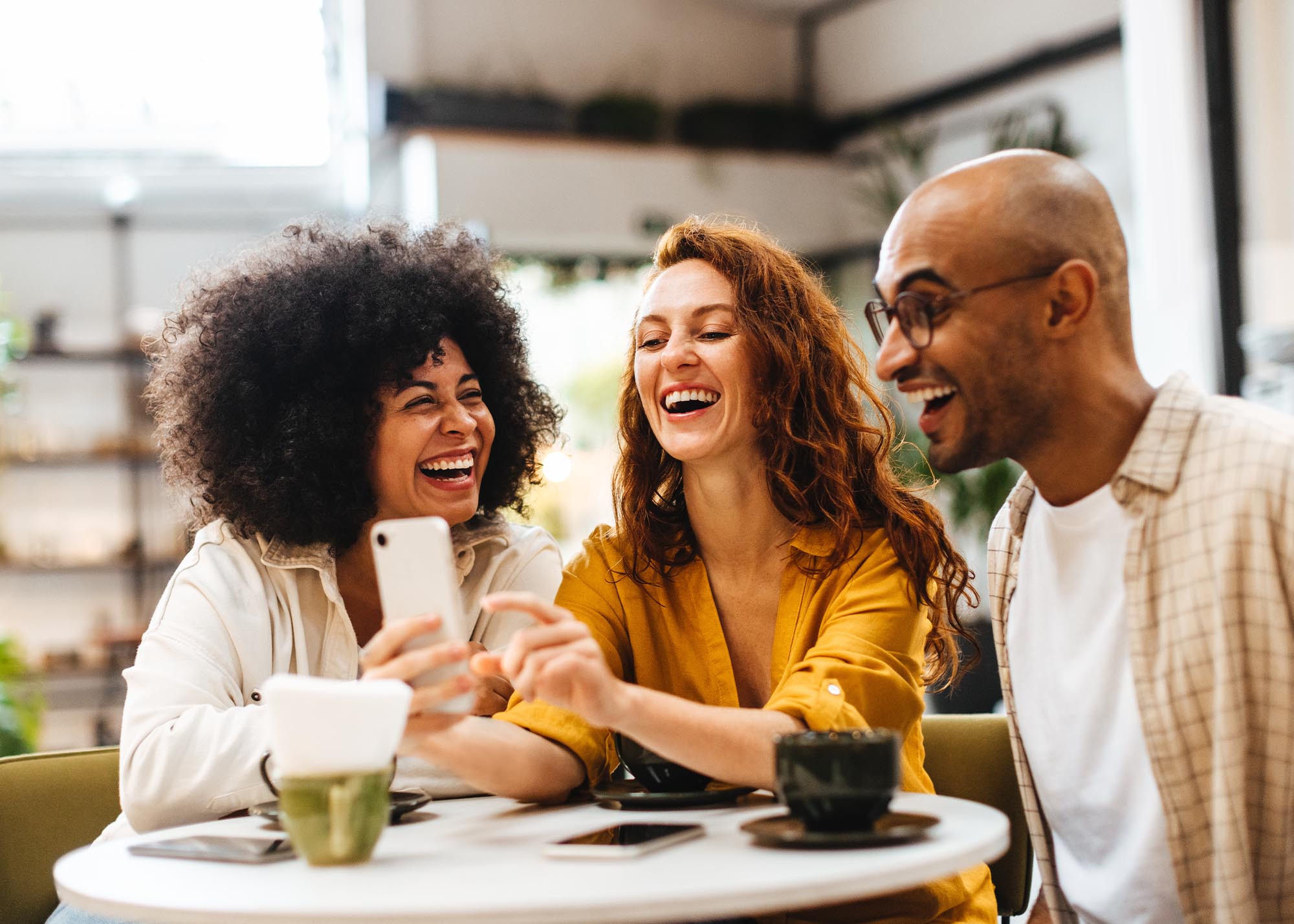 Friends having coffee at a coffee shop