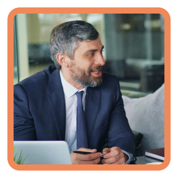 A professional lender wearing a suit speaking to client