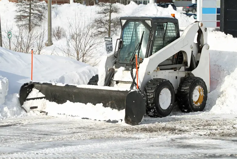 snow removal services performed by bobcat