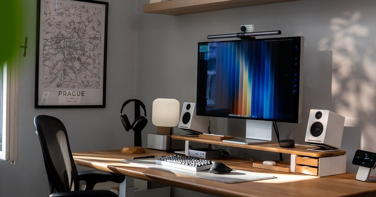 A clean, minimal desk setup: the deliberate clearing of space that the transition requires.