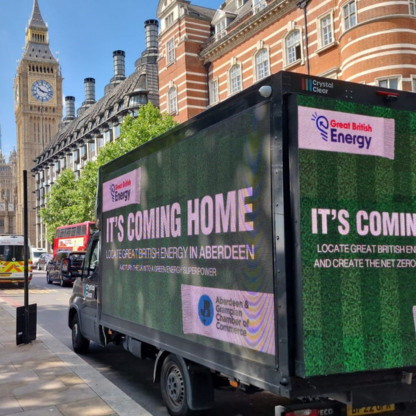 Three black trucks with red text reading 'LOST ALL BELIEF?' parked in front of the Palace of Westminster and Big Ben in London.