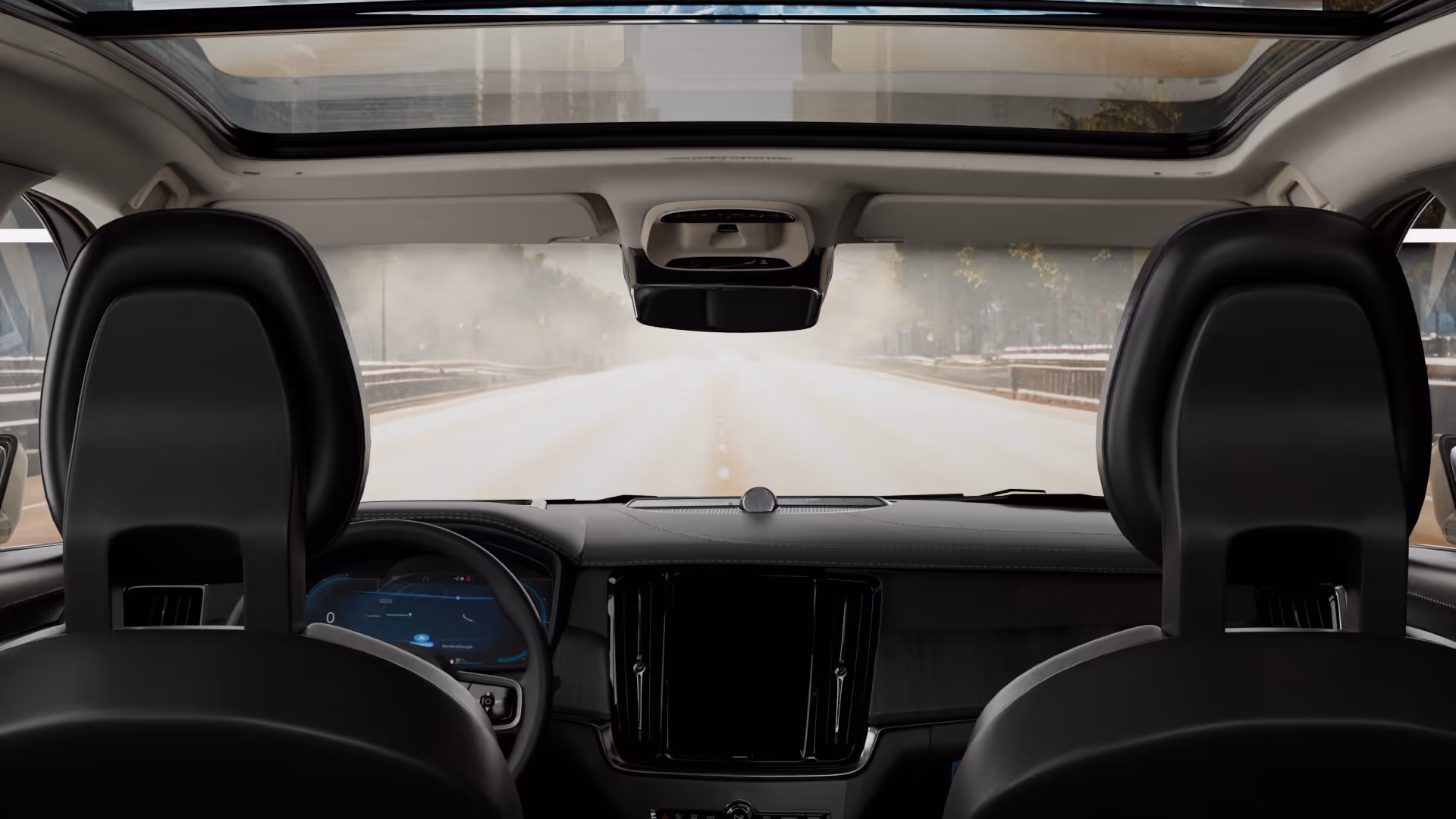 Car interior showing black front seats and back seats with a rollable screen .