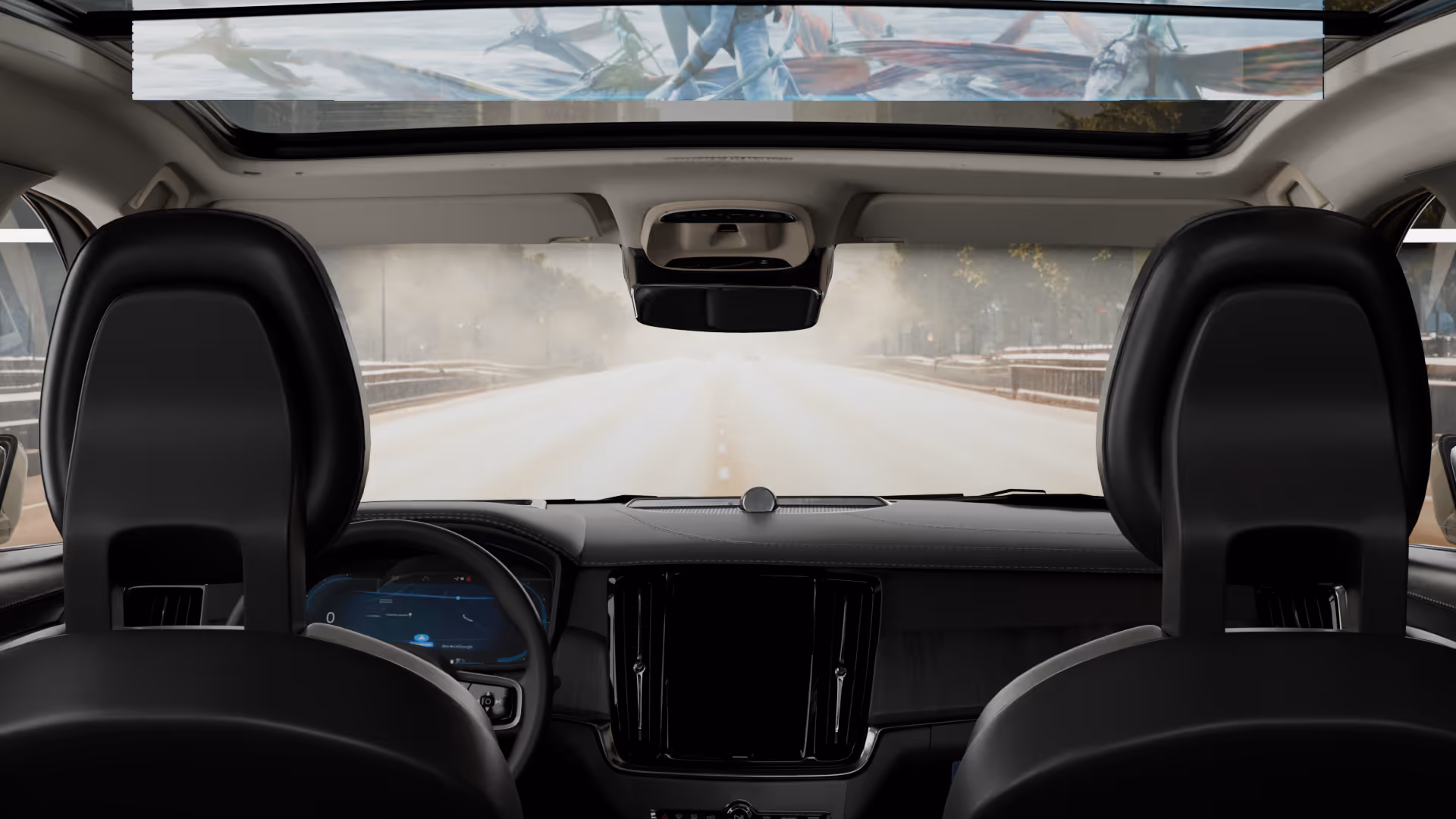 Car interior showing black front seats and a large half extend rollable screen displaying a scene from the movie Avatar.