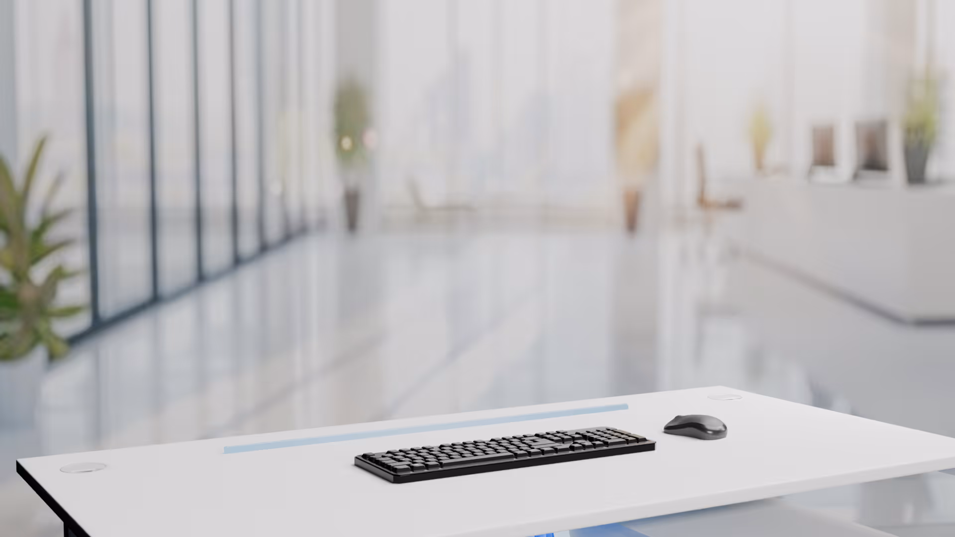 Black wireless keyboard and mouse on a white office desk with Rollable screen hide in the office desk in a bright modern workspace.