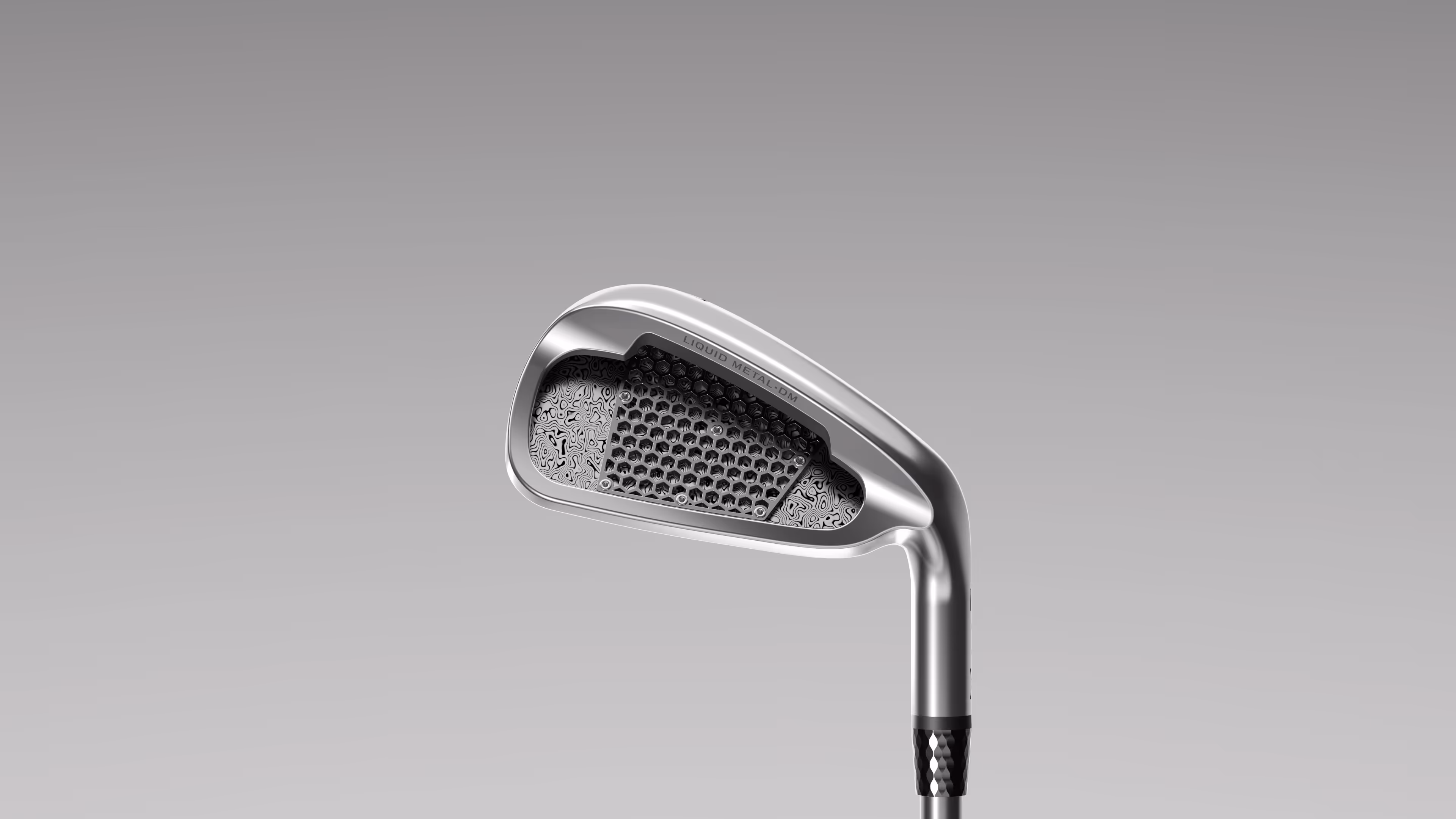 Golf iron club with a honeycomb and patterned face labeled Liquid Metal-DM.