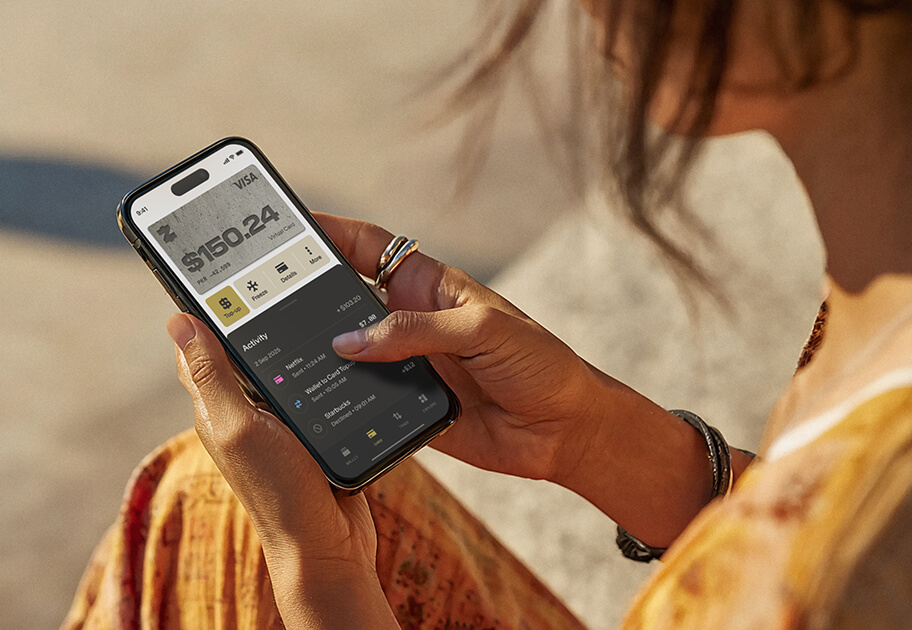 person holding a phone using the zar app