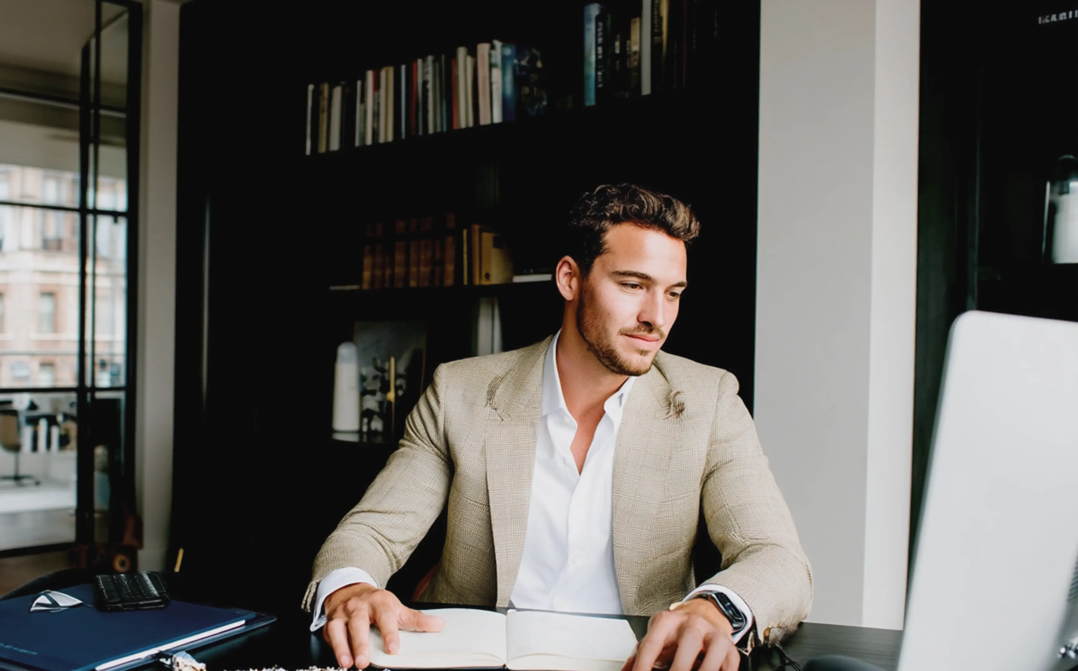 A man sitting in his office while working