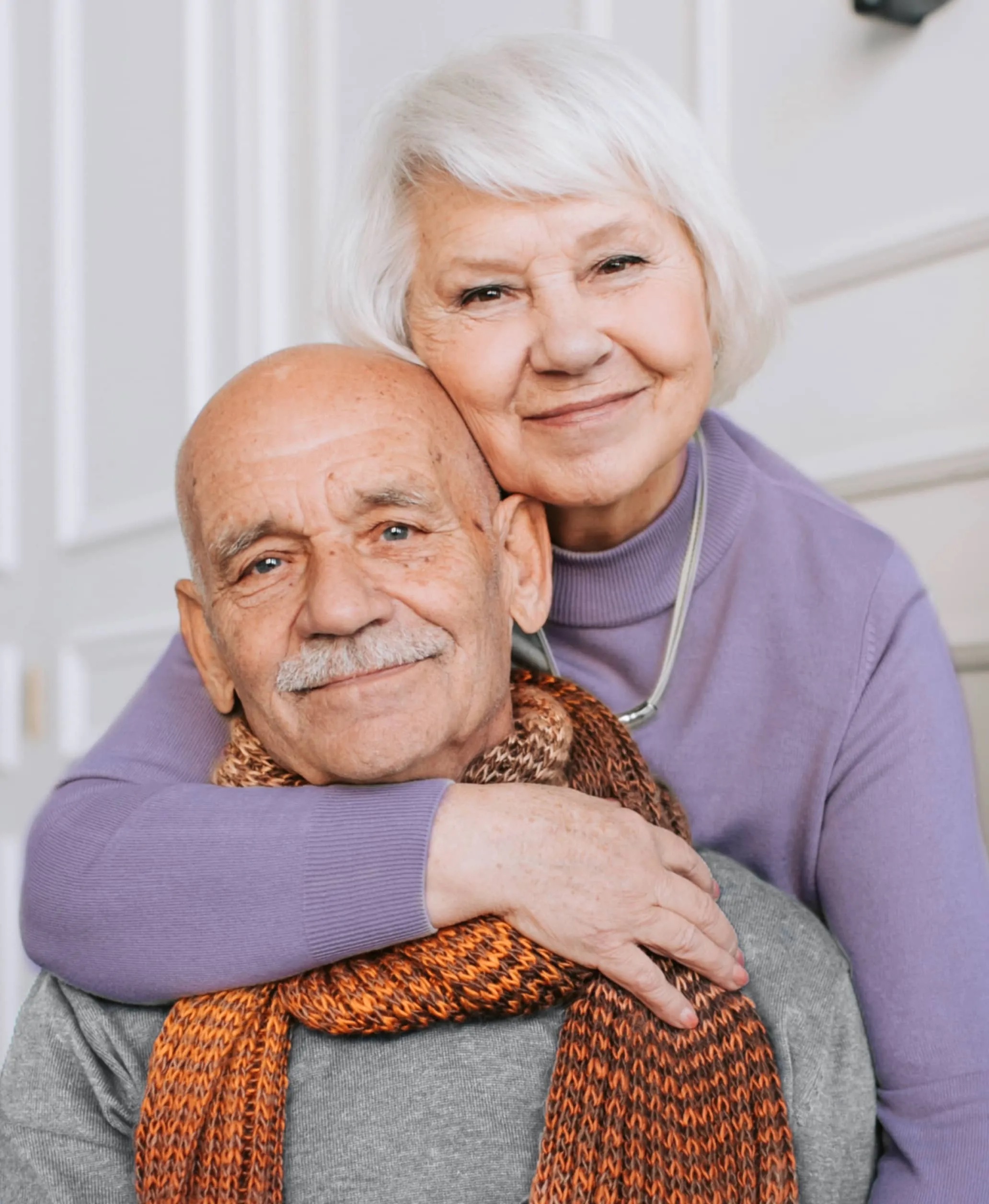 The Right Care For Your Loved Ones Seniors Couple Hug Image Left - ElderlyCare X Webflow Template