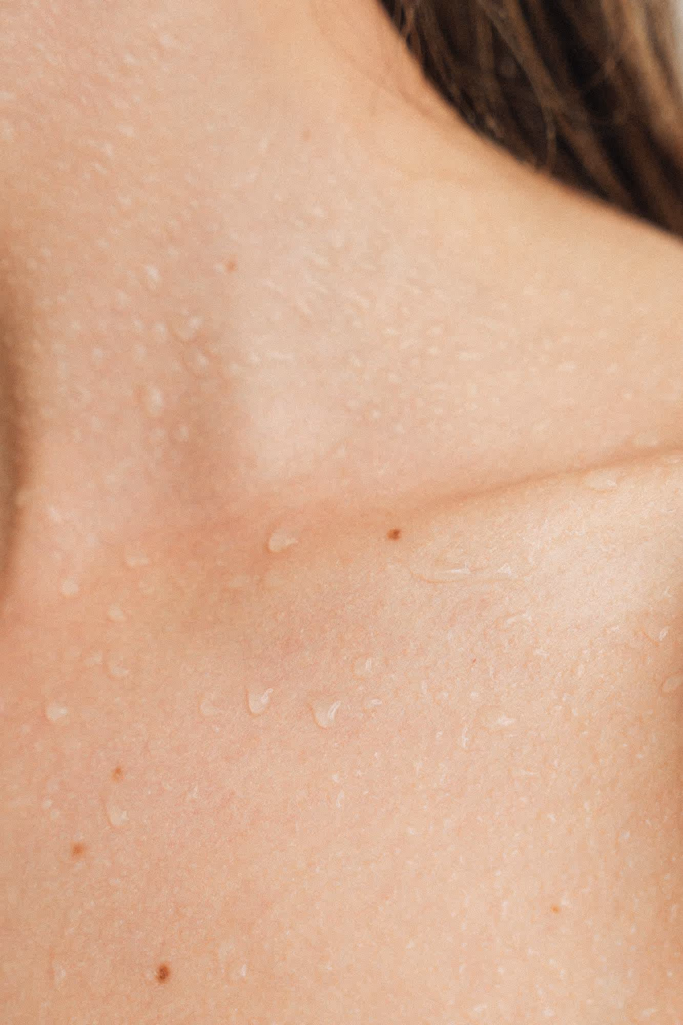 Close-up of youthful skin showing smooth texture and natural radiance.