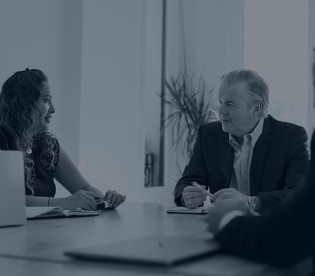 Bill Derrenger speaking to a client