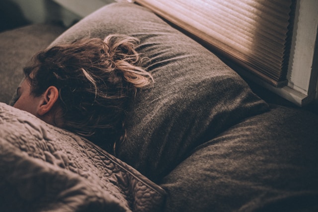 Woman struggling to sleep 