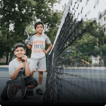 students playing tennis