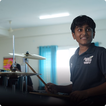 boy playing drum