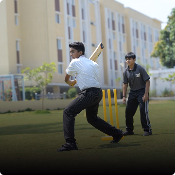 students playing Cricket