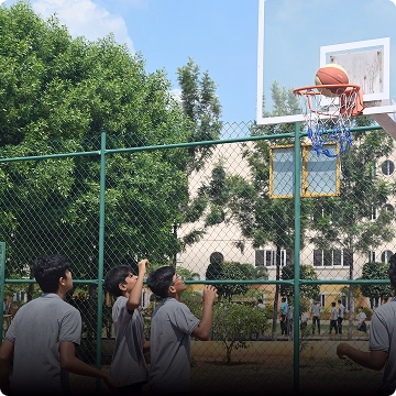 Students playing Basketball