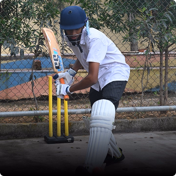Students playing Cricket