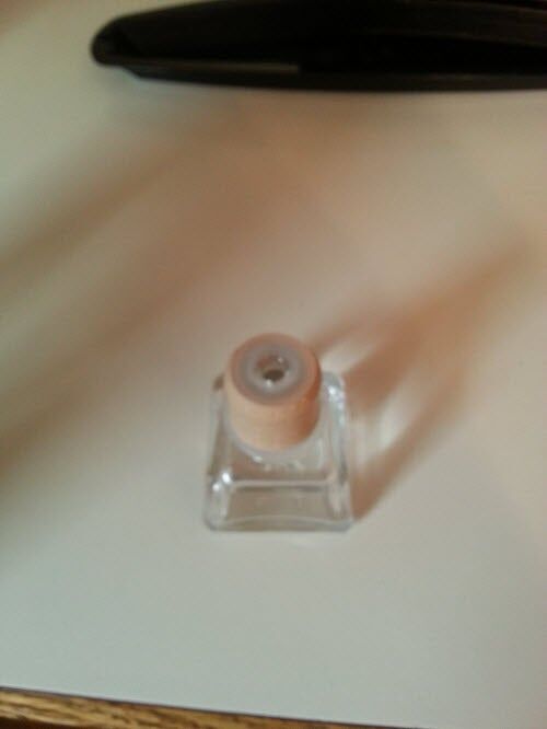 Shot glass with a stopper