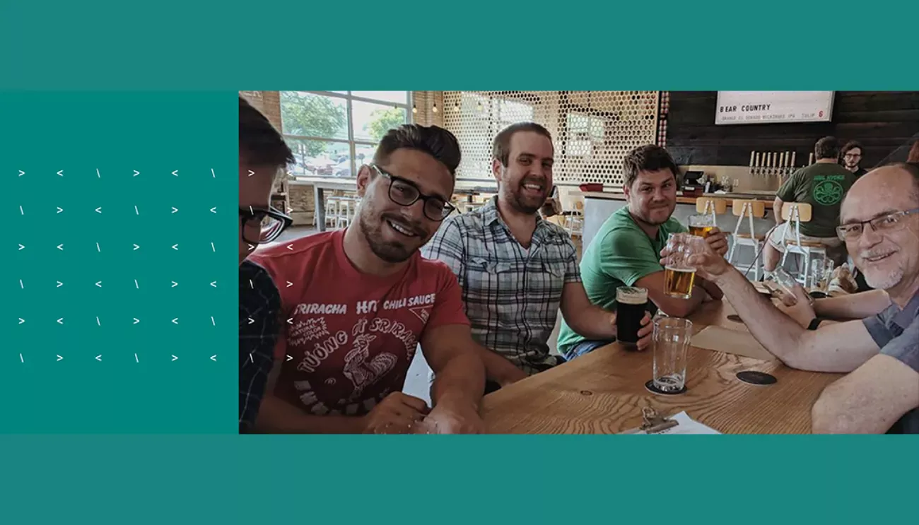 High Monkey employees sitting around a table