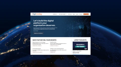 Screenshot of the new High Monkey homepage, shown over a backdrop of Earth from orbit at night with city lights and stars visible.