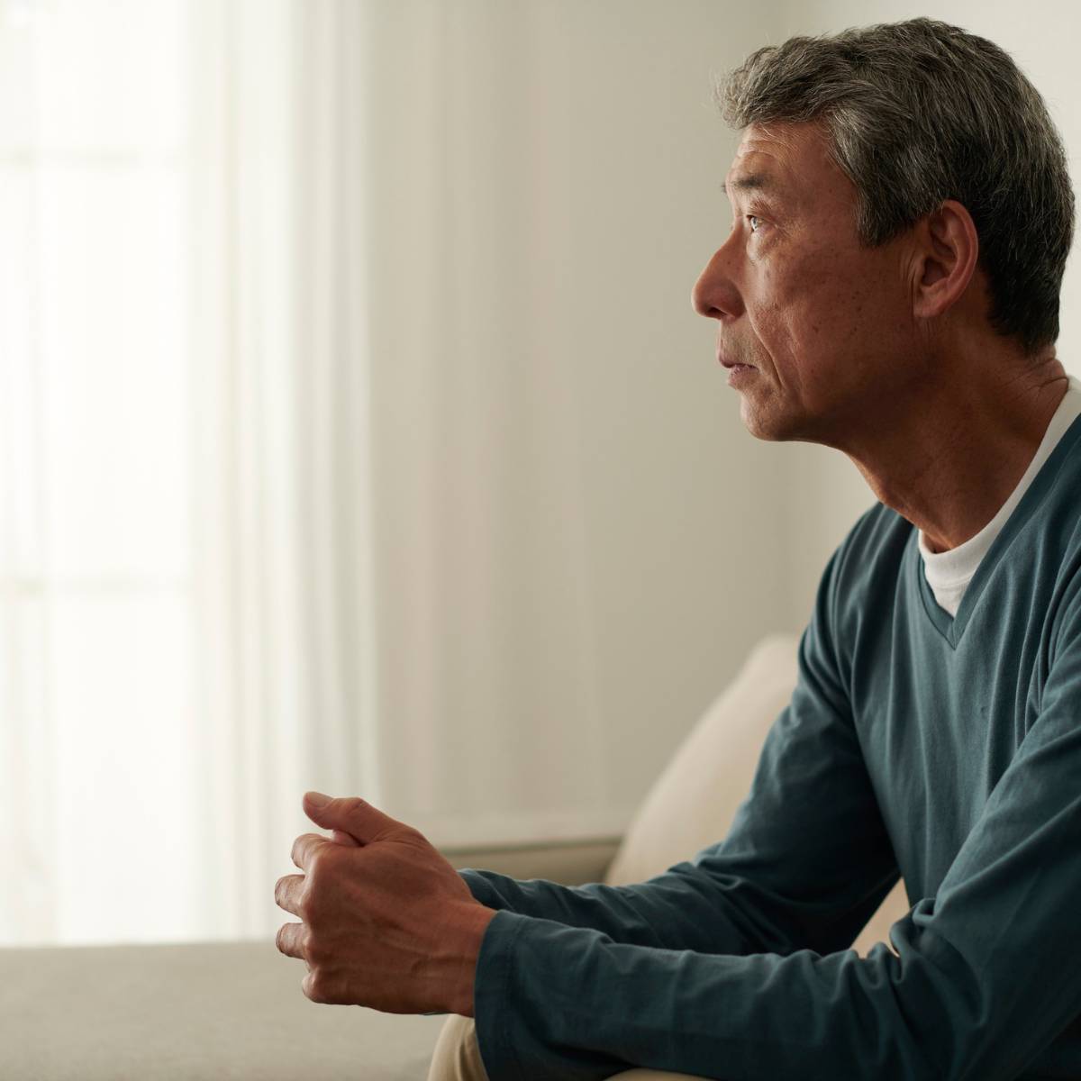 Worried man looking away